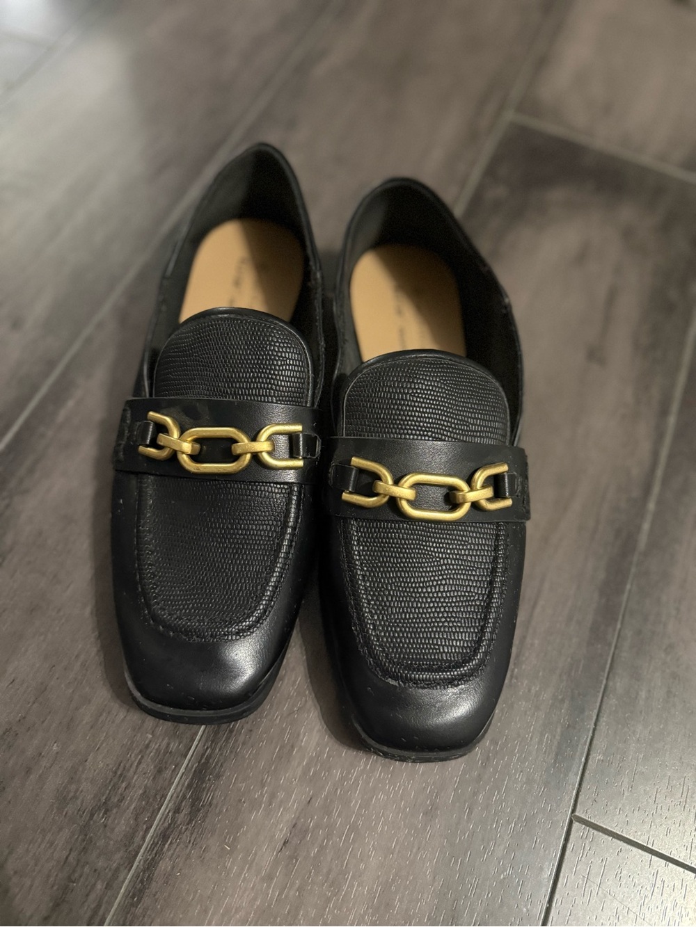 Woman’s Black Leather Loafers with Gold Chain Accent